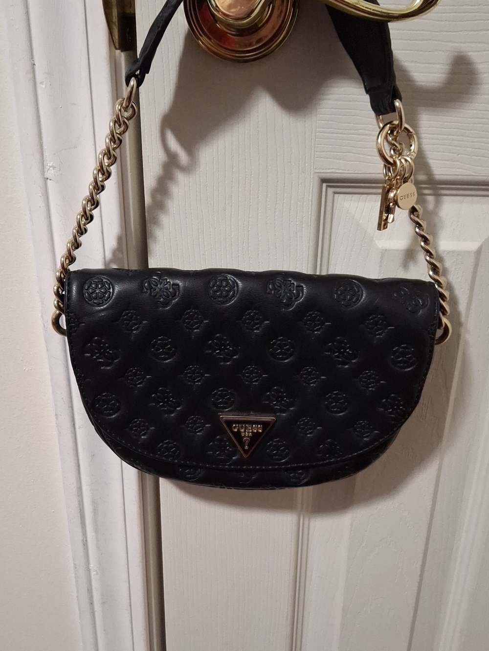 GUESS Black Embossed Leather Shoulder Bag with Gold Chain and Charm Accent